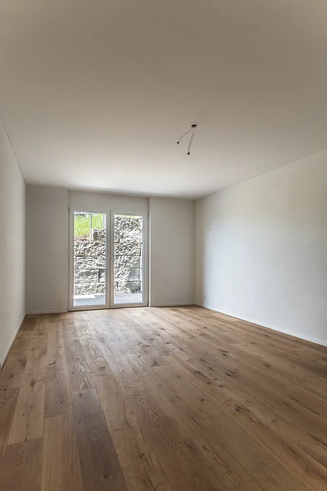 Modern 3.5-room apartment in Oberhelfenschwil – New building with seating area and magnificent view
