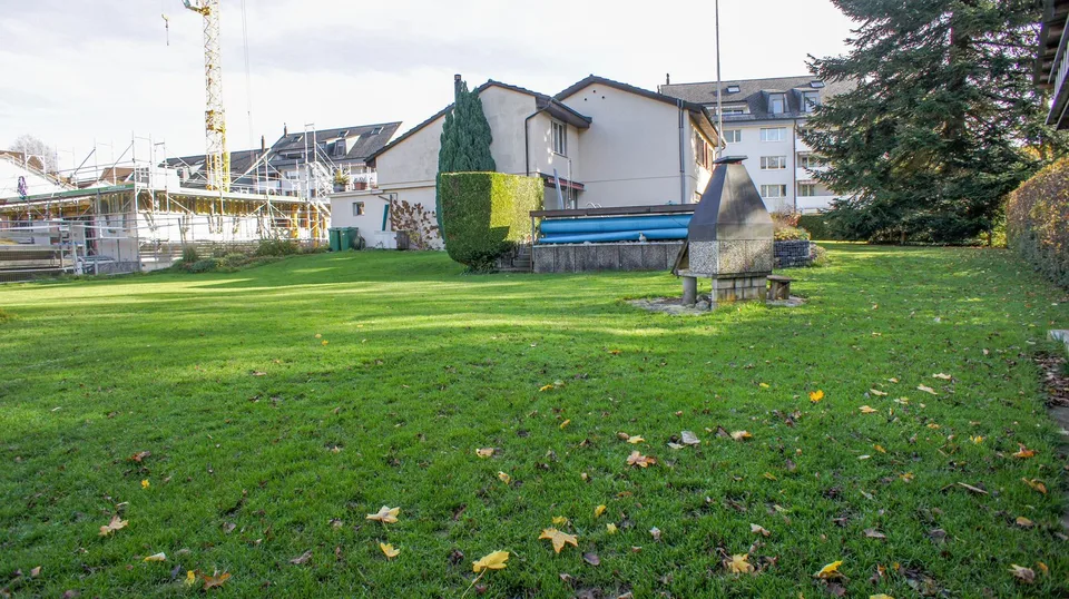 Terreno con casa unifamiliare