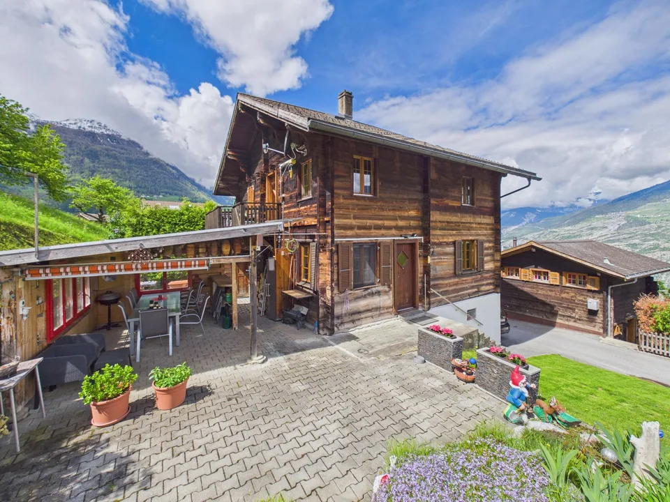 Charming Chalet with Building Land and Large Summer Loggia in Ergisch