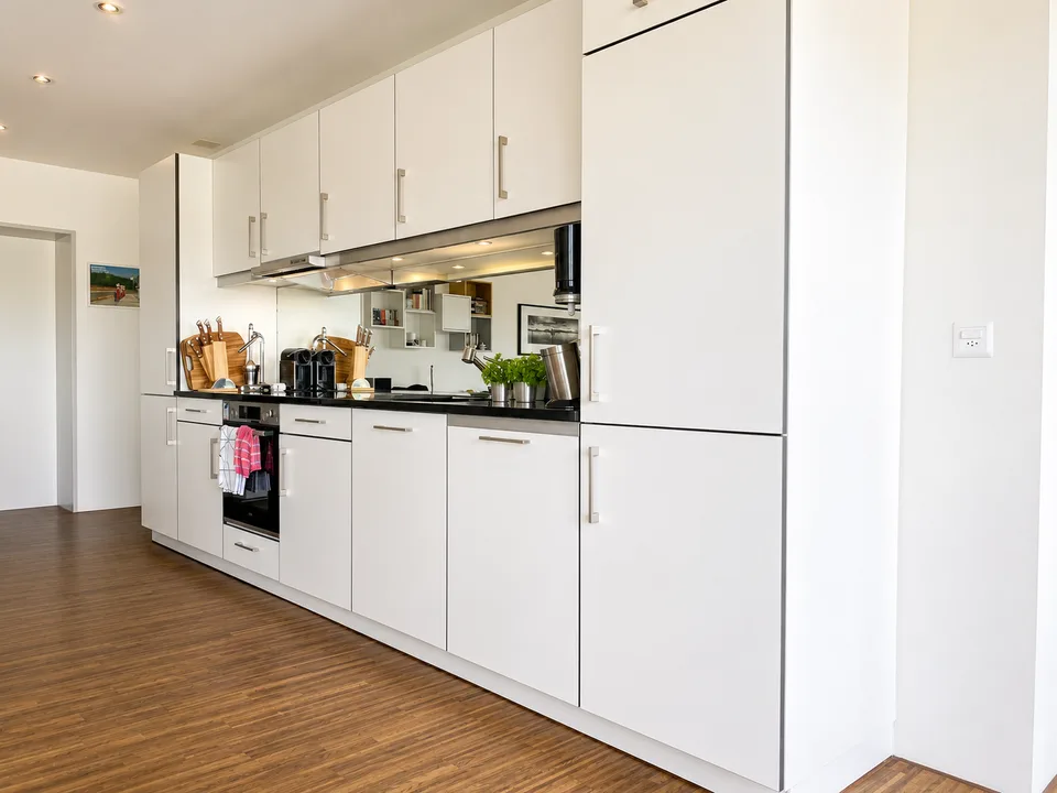 Appartamento esclusivo 3.5 locali con vista panoramica e garage doppio con stazione di ricarica E
