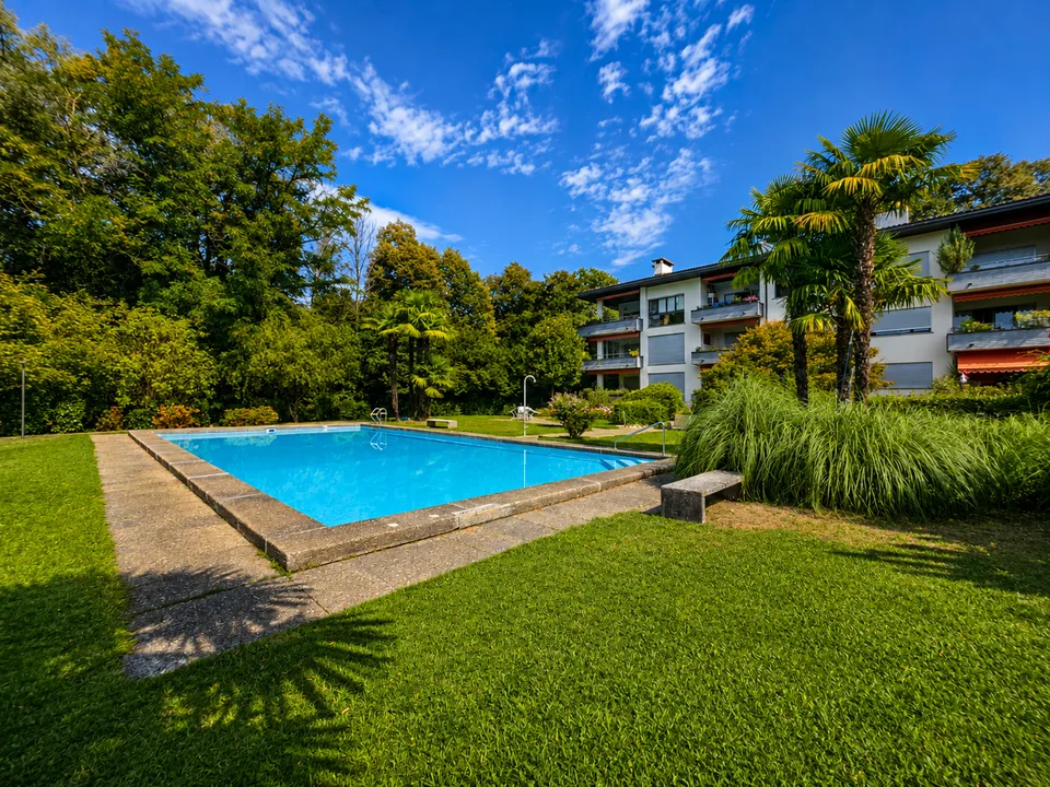 Ponte Capriasca: Elegante 2 locali con splendida terrazza immersa nel verde e piscina condominiale