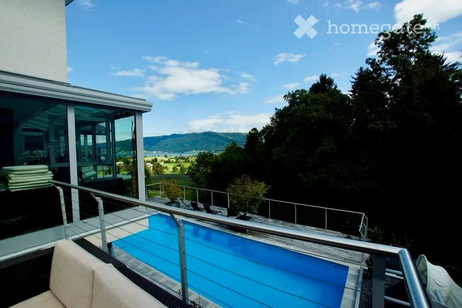 Maison unifamiliale avec piscine et vue à Meierskappel