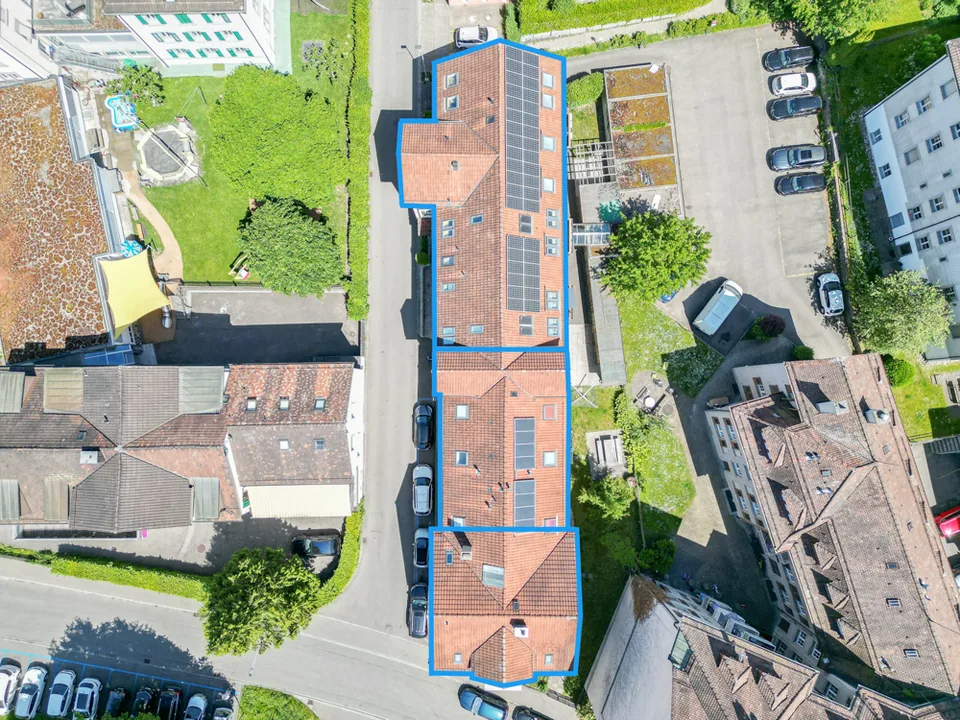 Drei Mehrfamilienhäuser auf einer Parzelle in zentraler Stadtlage
