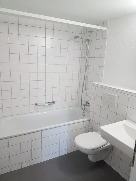 Appartement moderne 2.5 pièces avec balcon dans un emplacement central