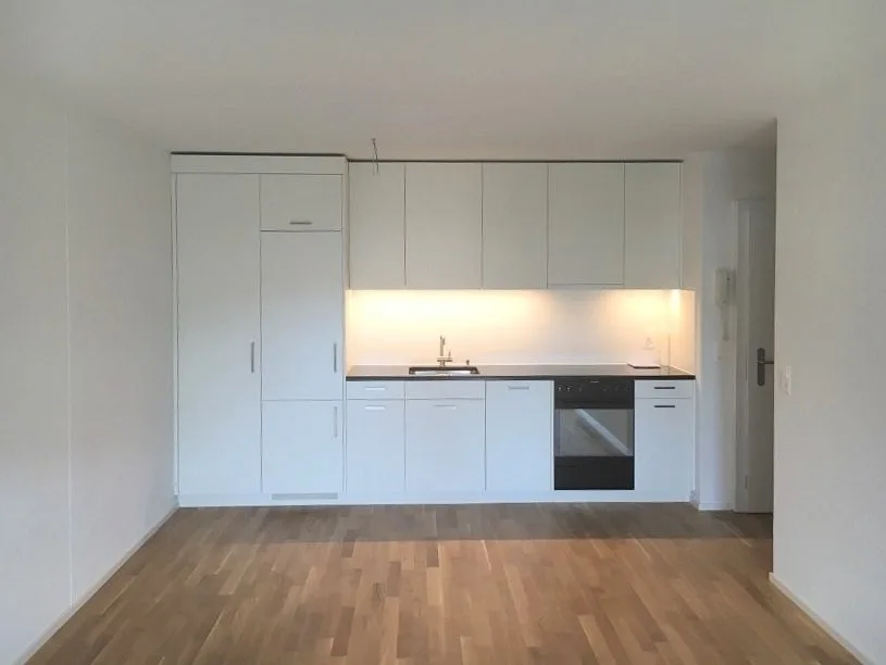 Appartement moderne 2.5 pièces avec balcon dans un emplacement central