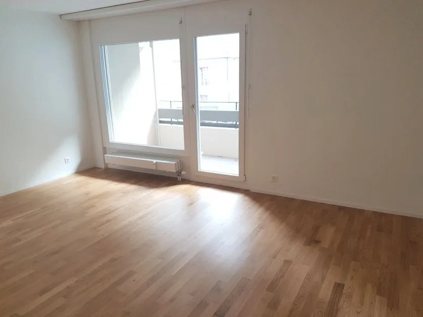 Appartement moderne 2.5 pièces avec balcon dans un emplacement central