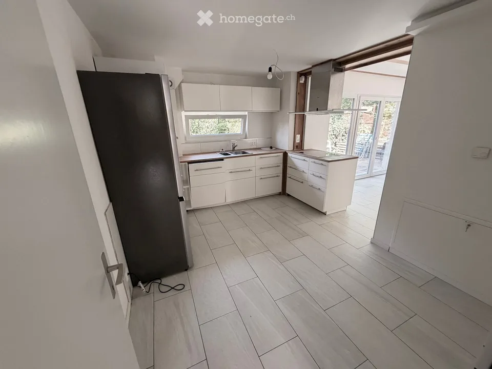 Spacious 9-room multi-family house (also usable as a single-family house) in a quiet location in Bettingen