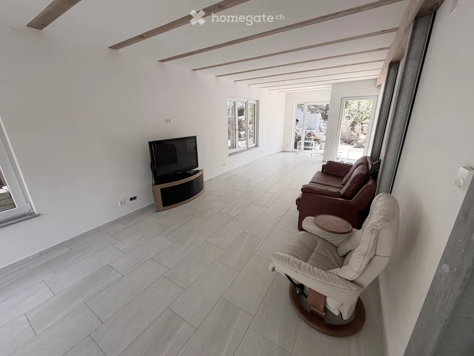 Spacious 9-room multi-family house (also usable as a single-family house) in a quiet location in Bettingen