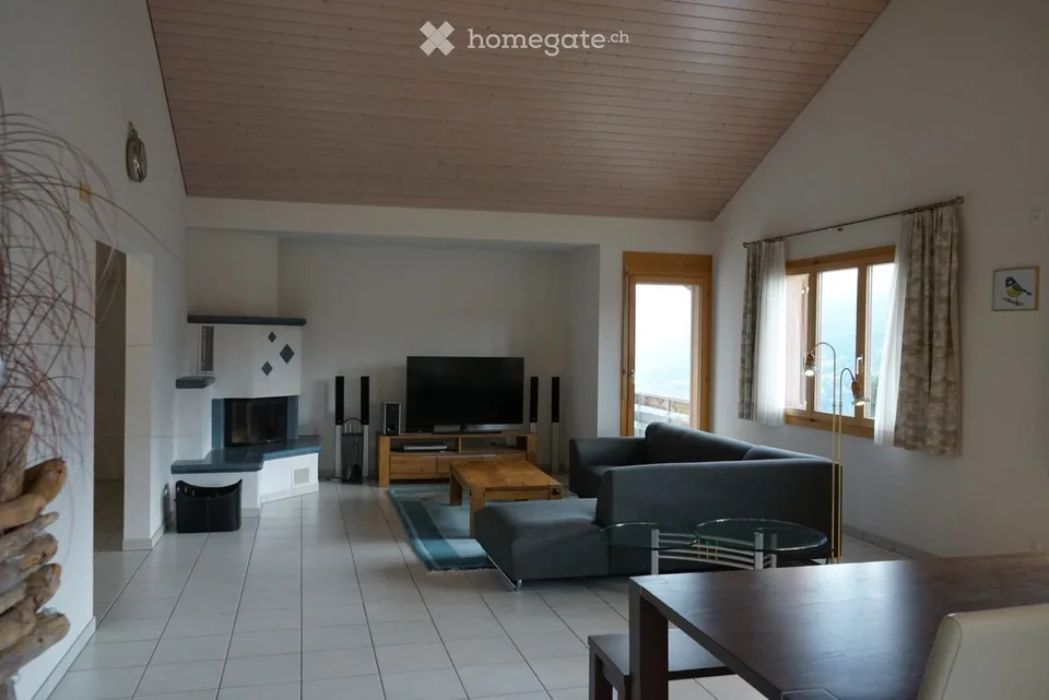 Building land with single-family house and panoramic view in Pany, Grisons