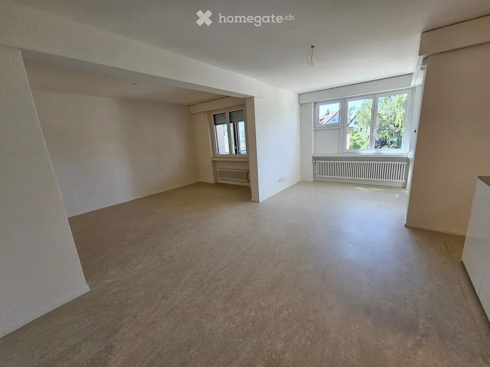 Un joyau résidentiel avec deux entrées et deux balcons