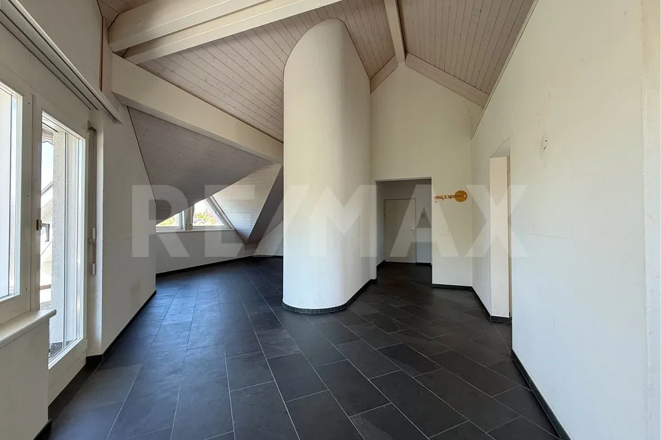 Charmante Dachwohnung mit Cheminée und Terrasse in ruhigem Quartier