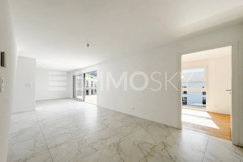3.5 pièces neuf avec combles d'env. 69 m² et grand balcon (Lot B5-8.1)