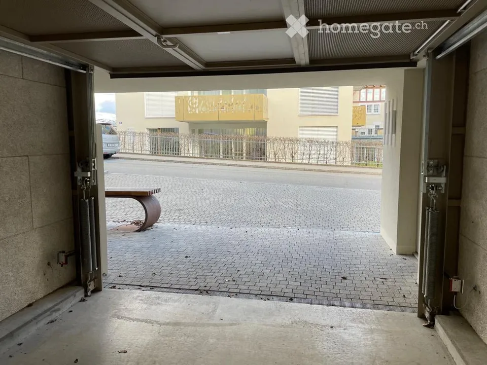 Parkplatz Einstellhalle mit Ladestationen für Elektroautos