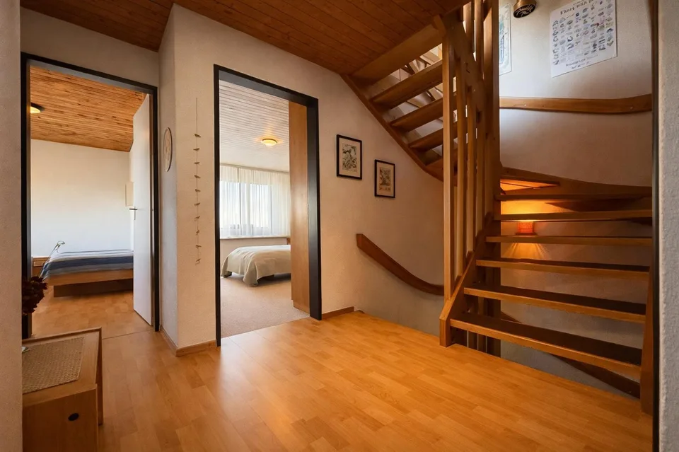 Family-friendly semi-detached house with winter garden and beautiful views in Hinteregg