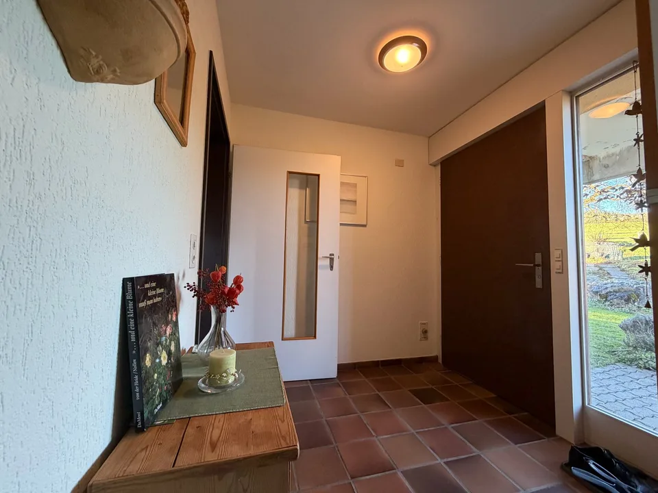 Family-friendly semi-detached house with winter garden and beautiful views in Hinteregg