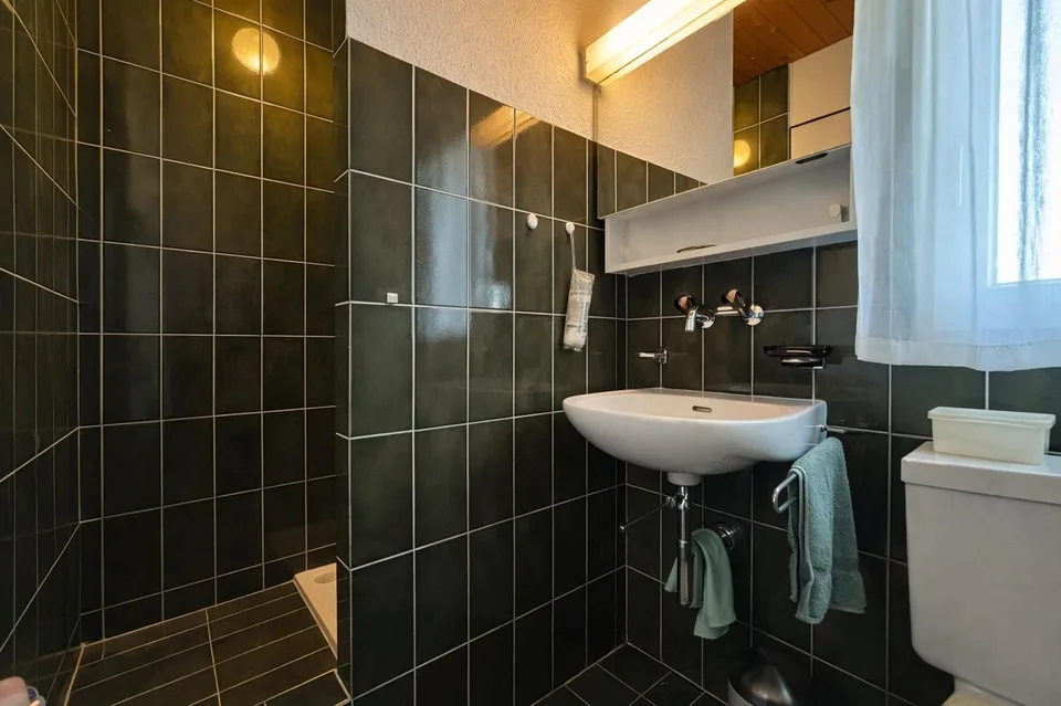 Family-friendly semi-detached house with winter garden and beautiful views in Hinteregg