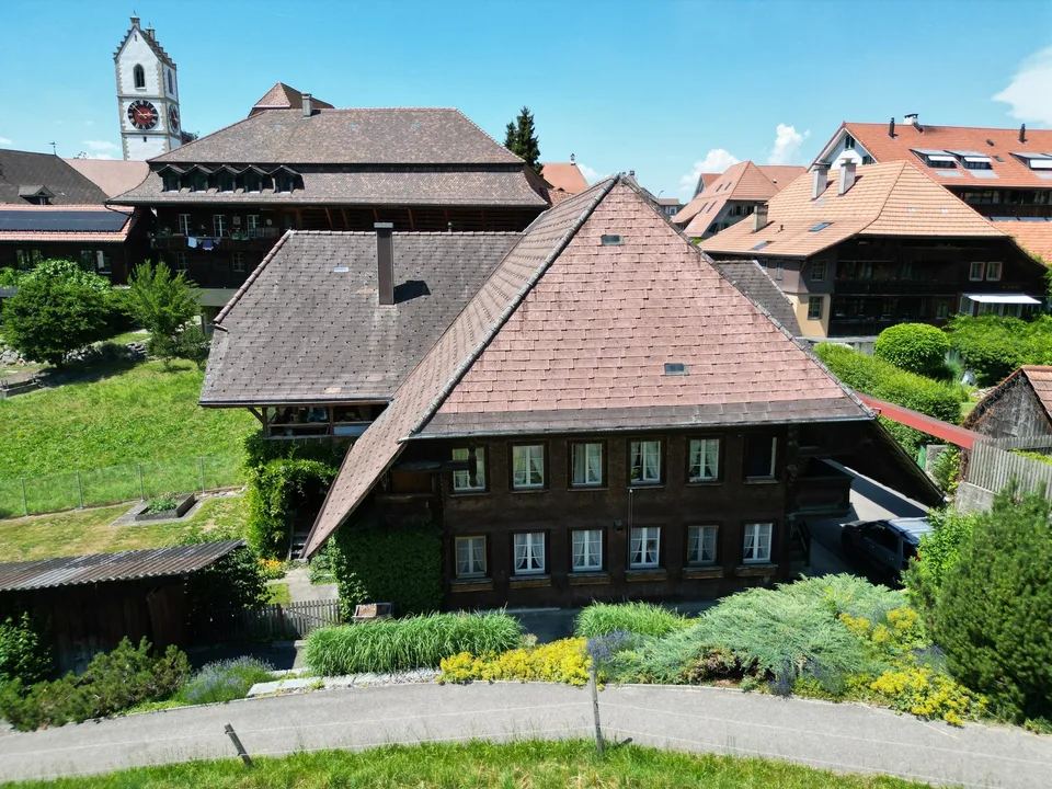 Multi-family house with commercial space in Sumiswald