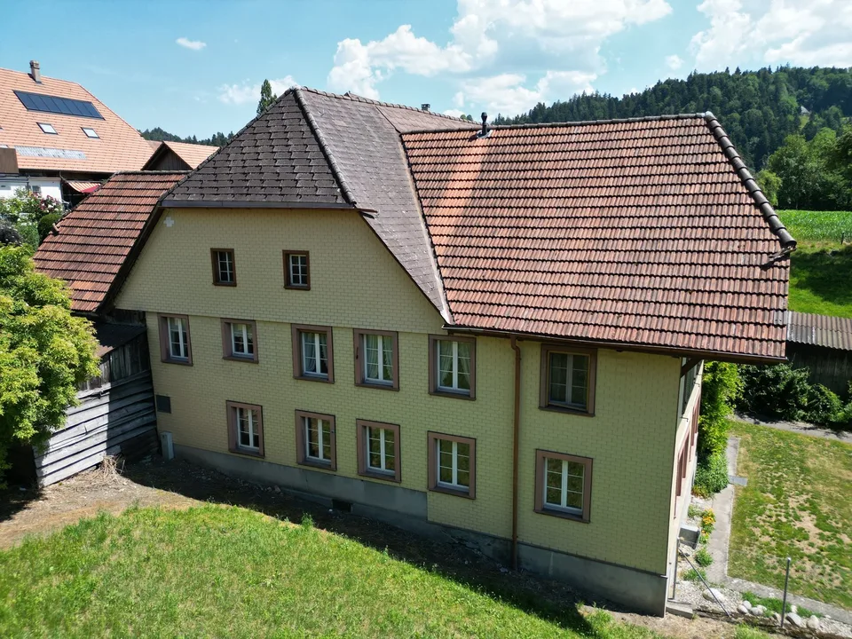 Multi-family house with commercial space in Sumiswald
