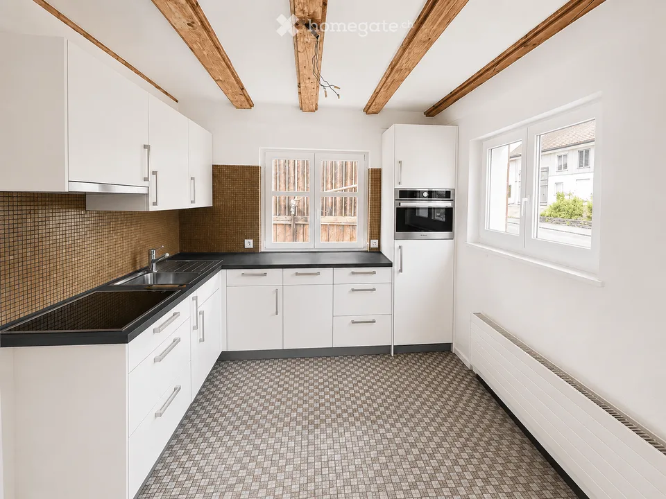 Charmante 3.5-Zimmer-Maisonettewohnung mit Dachgalerie und Gartenparadies in Weinfelden