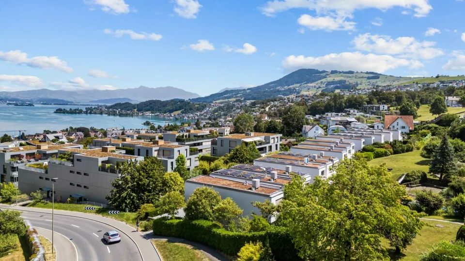 CHRUMMBÄCHLI | Modern single-family house with award-winning architecture, air/water heat pump, PV system, 41m2 terrace, lake and mountain views
