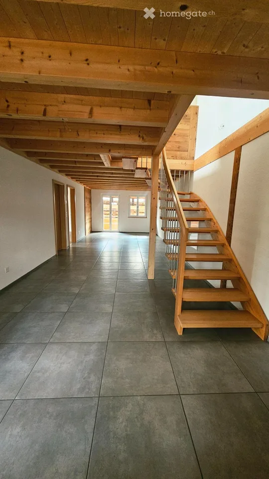 Modern 4.5-room maisonette apartment in a farmhouse with mountain panorama