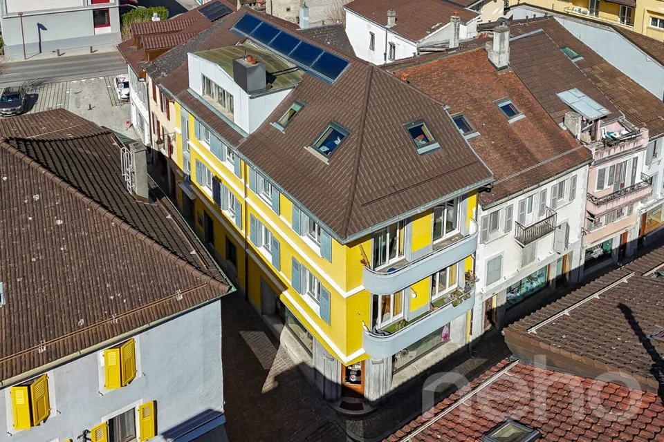 Immeuble mixte 2 Commerces + 3.5 + 8.5 en duplex