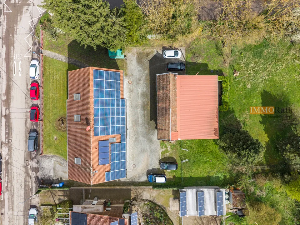 IMMORath.de - Modernized 4-room garden bliss with garage and enormous storage