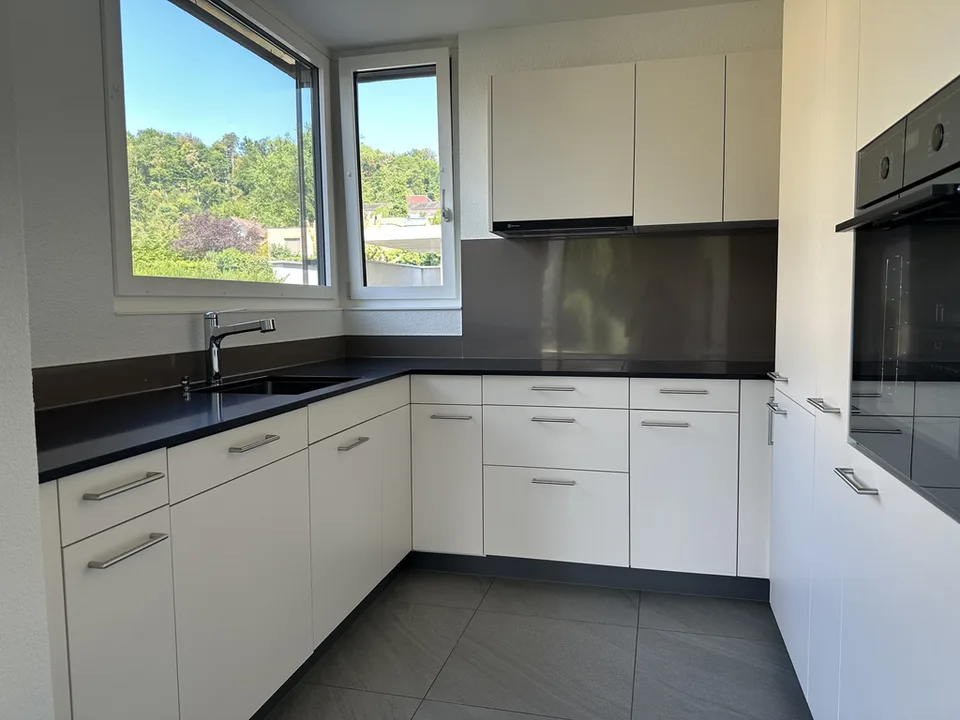 Nouvelle construction : appartement calme en centre-ville avec balcon
