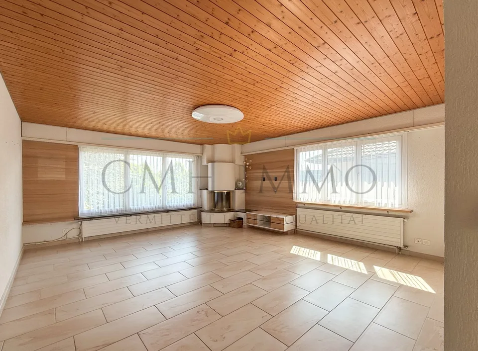 7.5-room single-family house with solar system, separate apartment, and dreamy garden