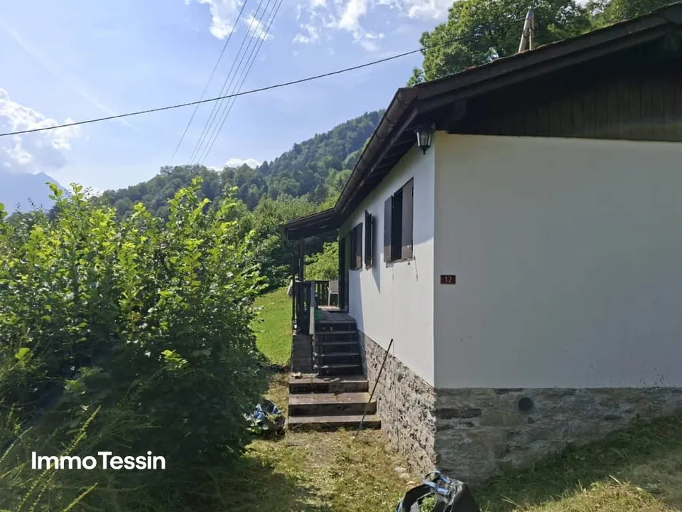 Cozy Ticino Rustico in a quiet location with fantastic mountain and valley views into the Blenio Valley