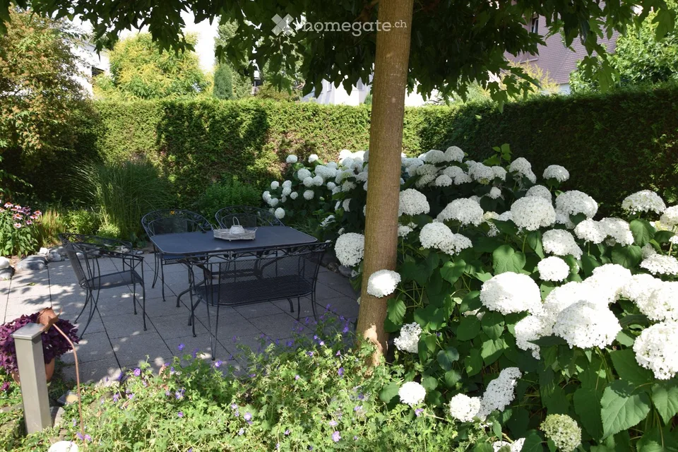 Freistehendes 5.5-Zimmer-Einfamilienhaus mit Wintergarten, Cheminée und traumhaftem Garten
