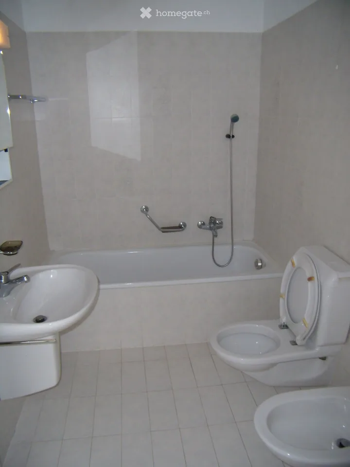 In a convenient area: very close to the bus stop and services.