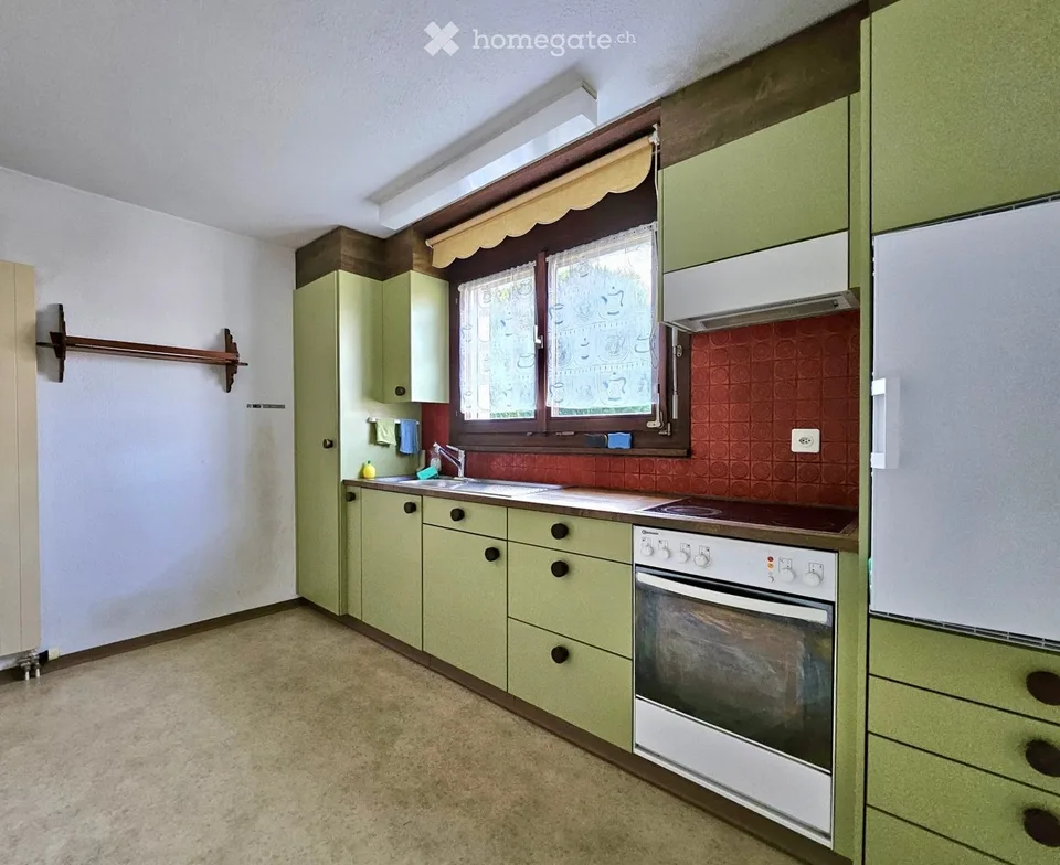 Attractive 7.5-room house with annex and building land