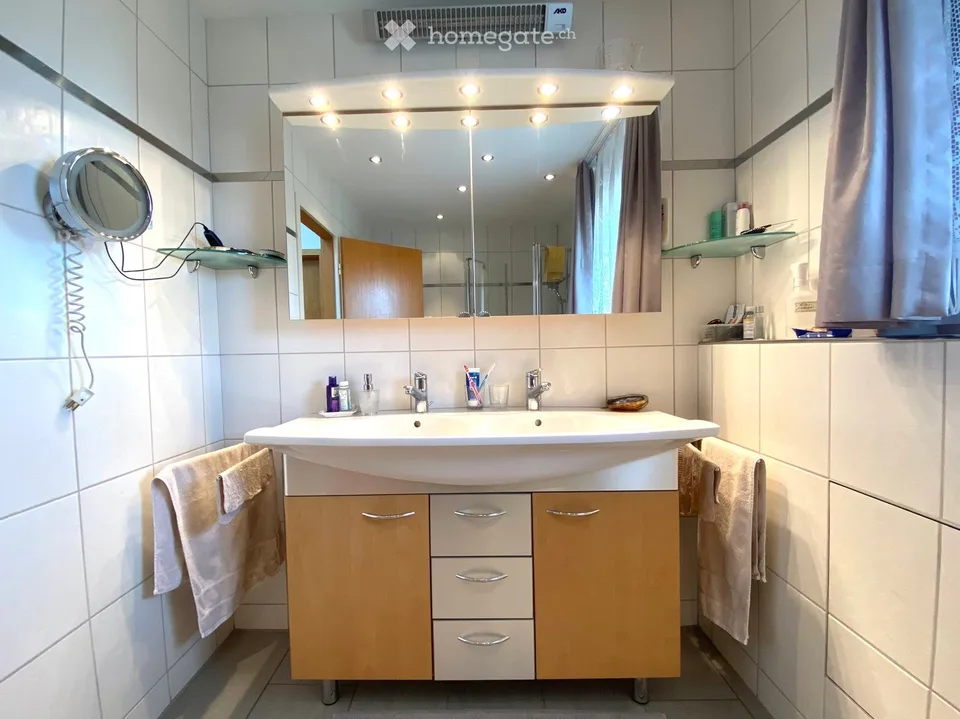 Attractive 7.5-room house with annex and building land