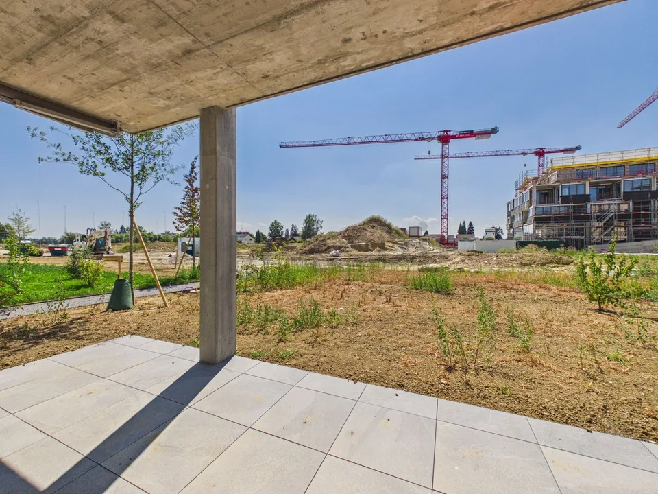 Neubau / Erstbezug: Eigener 120 m² Garten mit Parkblick, 40 m² Wohnbereich