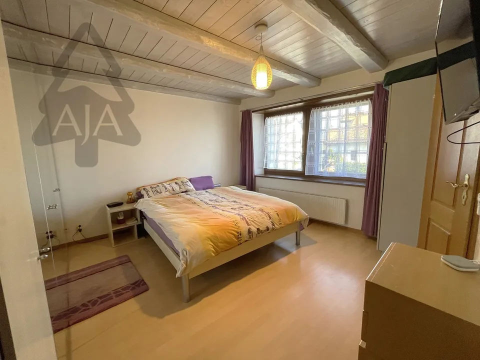 St-Aubin-Sauges, spacious 4.5-room apartment (121 m2) with private garden (53 m2), garage