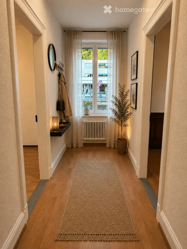 Appartement de 3,5 pièces dans un immeuble ancien, avec box de garage, parking extérieur et frais accessoires (hors eau chaude)