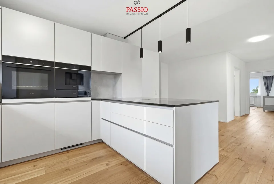 Appartamento di 4,5 locali ristrutturato con vista sulle Alpi e parte di giardino