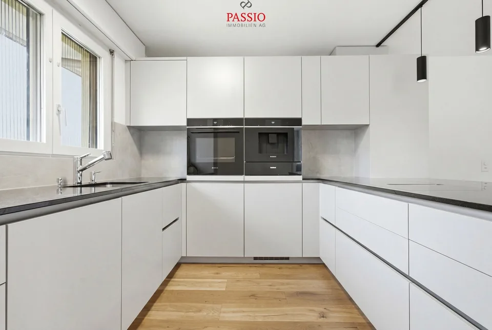 Appartamento di 4,5 locali ristrutturato con vista sulle Alpi e parte di giardino