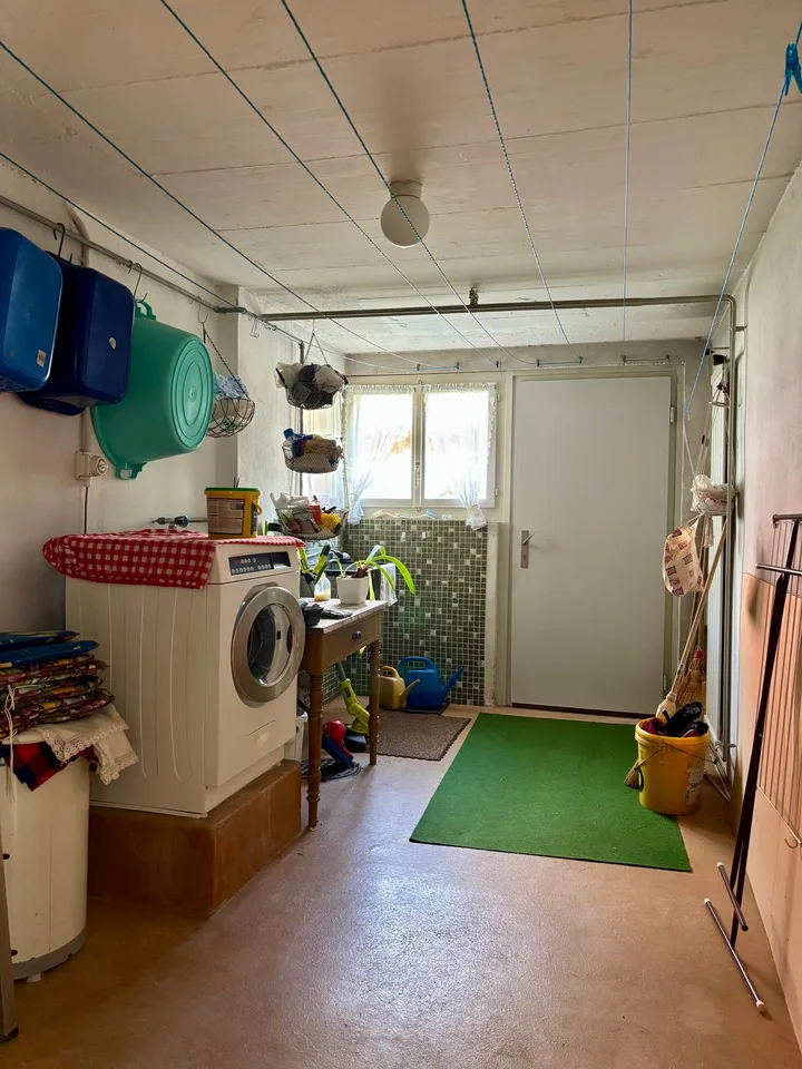 Single-family house with studio apartment in central location in Schattdorf