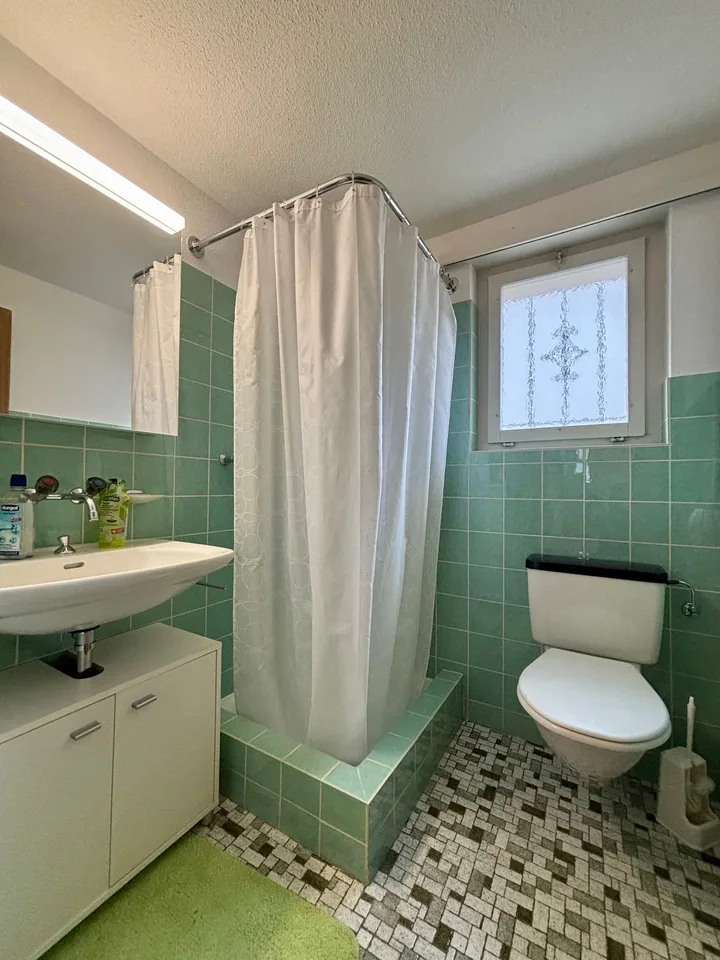Single-family house with studio apartment in central location in Schattdorf