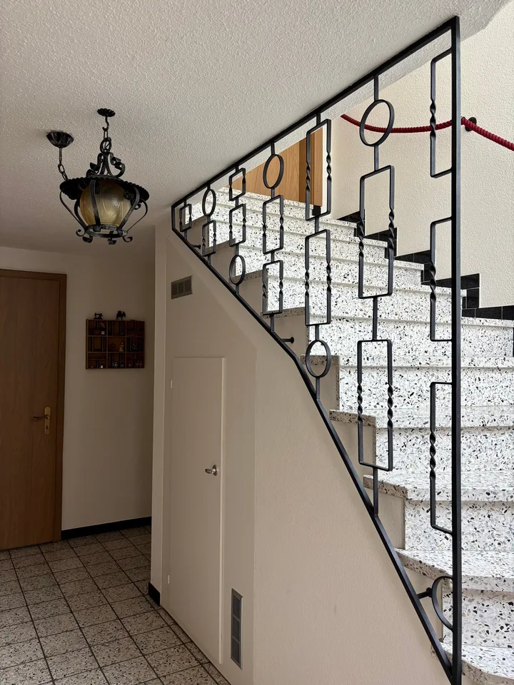 Single-family house with studio apartment in central location in Schattdorf