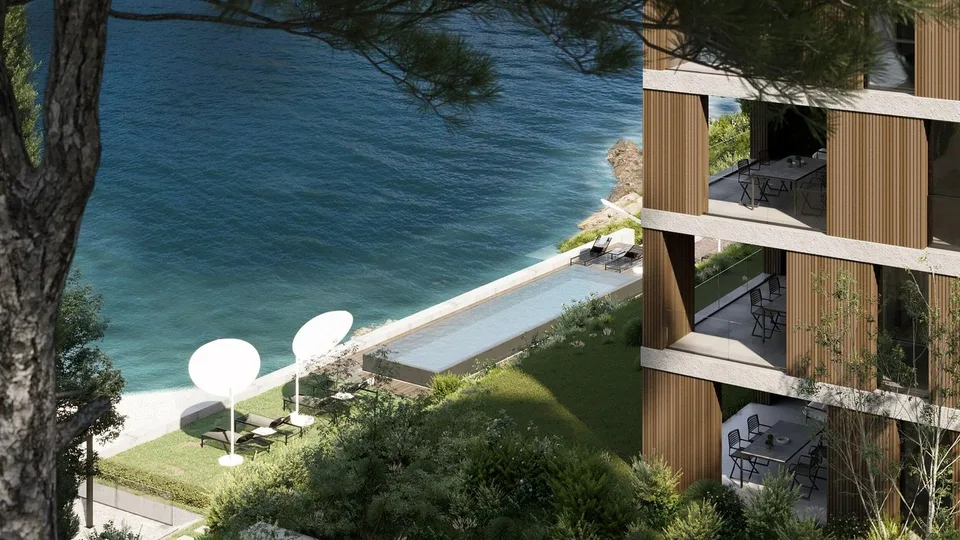 ELEGANTE BILOCALE FRONTE LAGO CON VISTA INCANTEVOLE