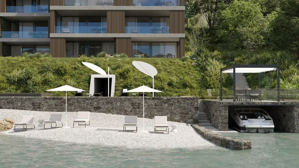 ELEGANTE BILOCALE FRONTE LAGO CON VISTA INCANTEVOLE