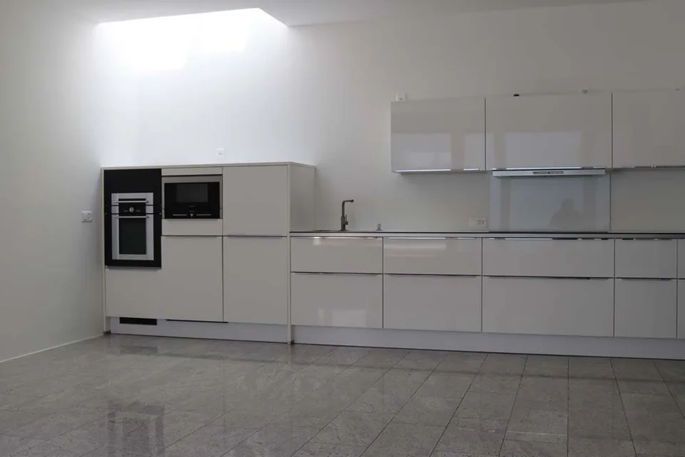 Modern 3.5-room apartment with private courtyard and top equipment in Zelgweg