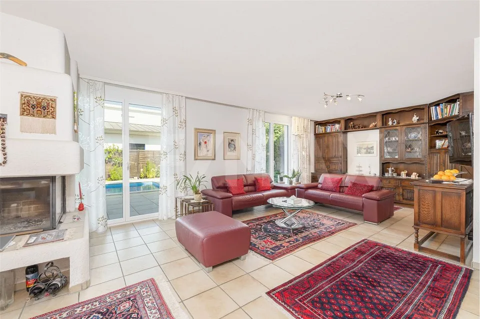Maison unifamiliale avec jardin d'hiver et piscine couverte
