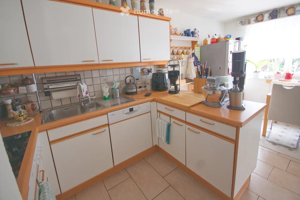 Charming 3.5-room garden apartment in a quiet location in Dänikon ZH