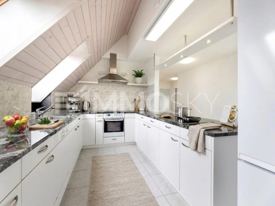Two attic residences with private lift directly in front of the door