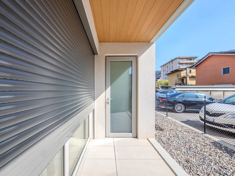 Appartement neuf de 2,5 pièces avec jardin privé et portique