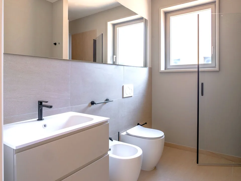 Appartement neuf de 2,5 pièces avec jardin privé et portique